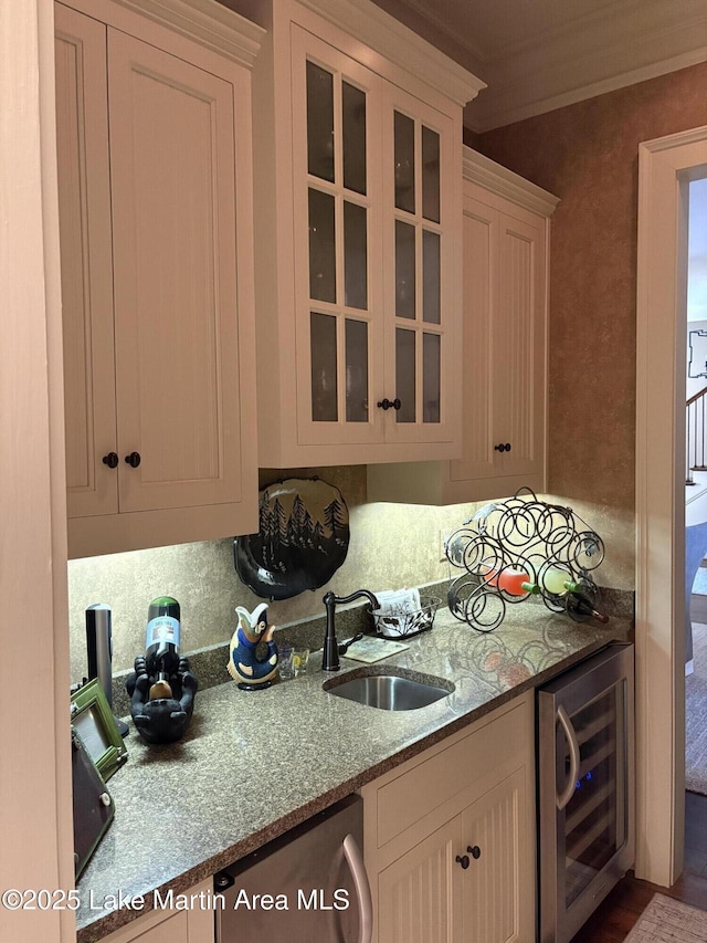 856 Windermere W Pkwy, Alexander City, AL 35010 - kitchen with beverage cooler, dishwasher, glass insert cabinets, crown molding, and light stone countertops