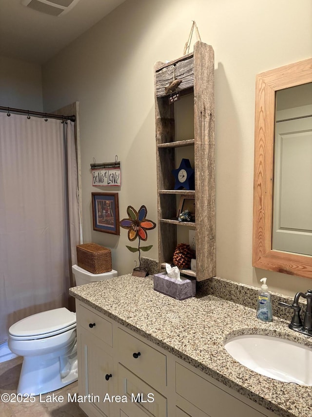 856 Windermere W Pkwy, Alexander City, AL 35010 - bathroom with vanity and a shower with shower curtain