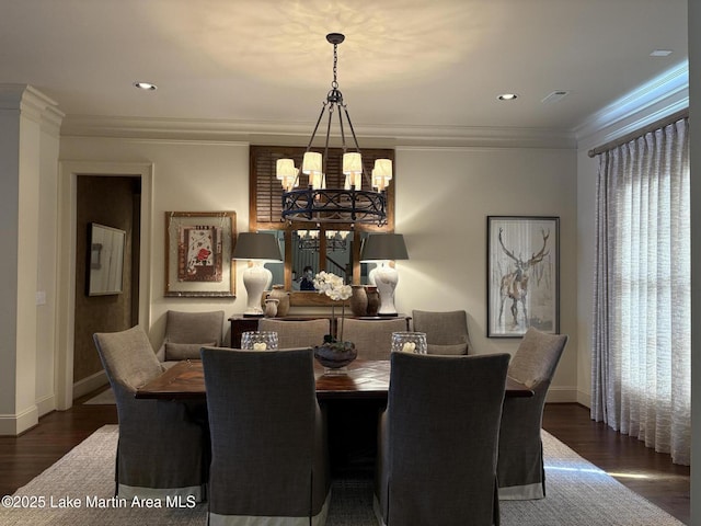 856 Windermere W Pkwy, Alexander City, AL 35010 - dining room featuring a chandelier, dark wood-type flooring, crown molding, and recessed lighting