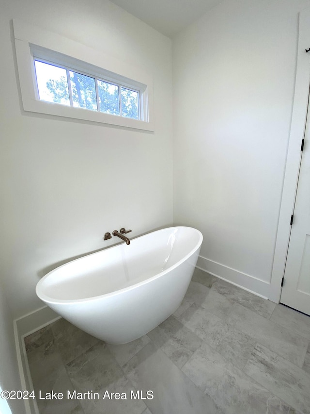 bathroom with a washtub