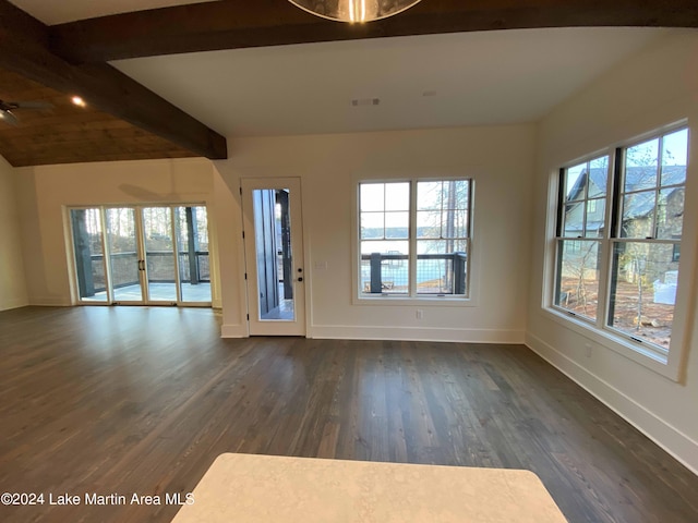 interior space with vaulted ceiling with beams and dark hardwood / wood-style flooring