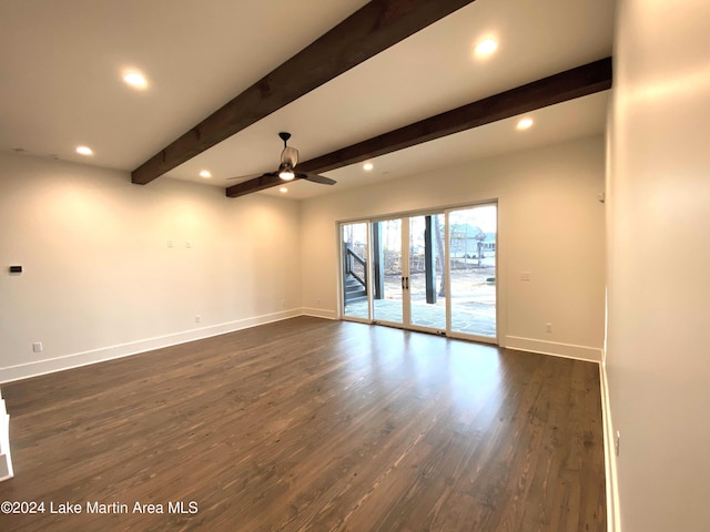 spare room with dark hardwood / wood-style flooring, ceiling fan, french doors, and beamed ceiling