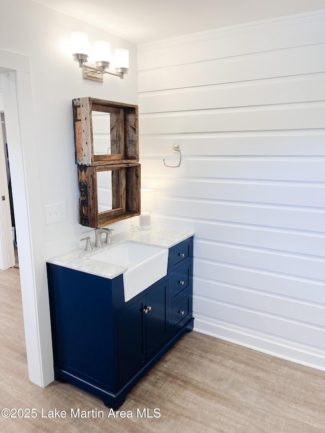 149 Lake Ridge Dr, Jacksons Gap, AL 36861 - bathroom with wood finished floors and vanity
