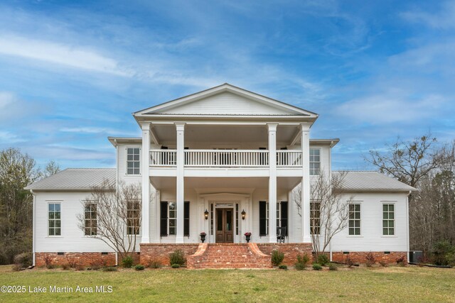476 Pear Tree Rd, Auburn, AL 36830 - neoclassical home with crawl space, a balcony, a front lawn, and a metal roof