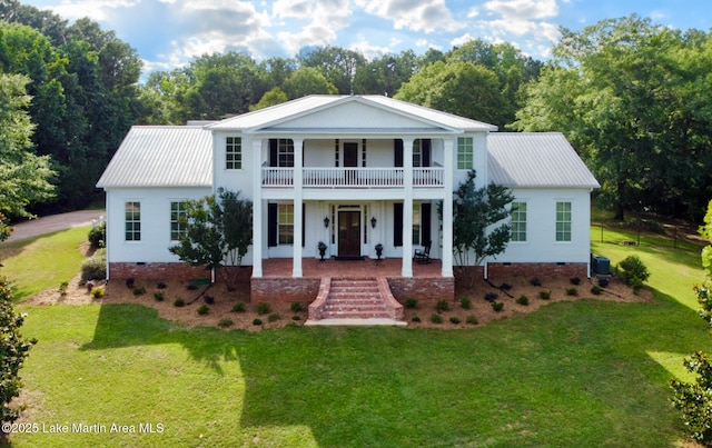 476 Pear Tree Rd, Auburn, AL 36830 - greek revival house with a porch, crawl space, a balcony, a front yard, and a metal roof