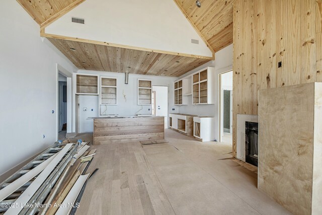 misc room featuring lofted ceiling