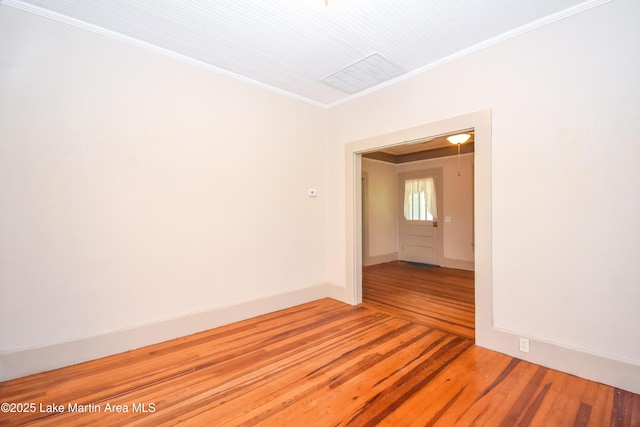 1330 Pearson Chapel Rd, Alexander City, AL 35010 - spare room with crown molding and light wood-style floors