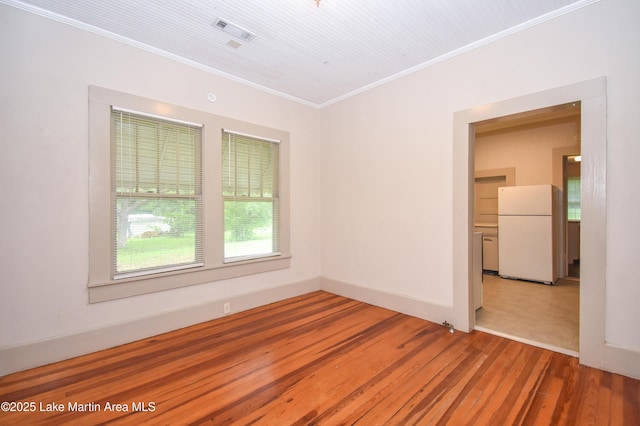 1330 Pearson Chapel Rd, Alexander City, AL 35010 - spare room featuring ornamental molding and wood finished floors