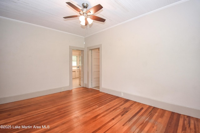 1330 Pearson Chapel Rd, Alexander City, AL 35010 - empty room with a ceiling fan, wood finished floors, and crown molding
