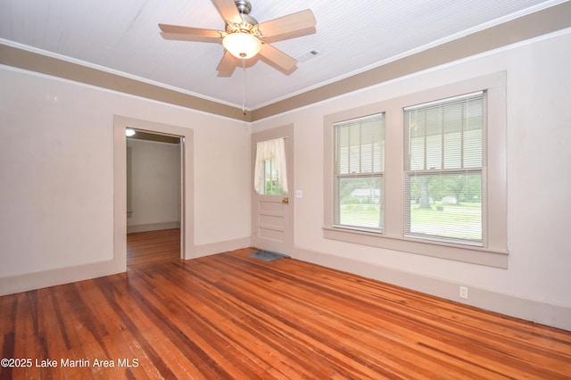 1330 Pearson Chapel Rd, Alexander City, AL 35010 - empty room with wood finished floors, ornamental molding, and a ceiling fan