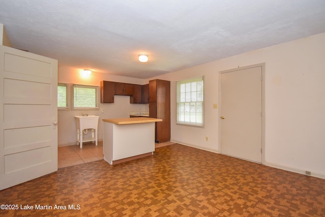 1330 Pearson Chapel Rd, Alexander City, AL 35010 - kitchen with baseboards and light countertops