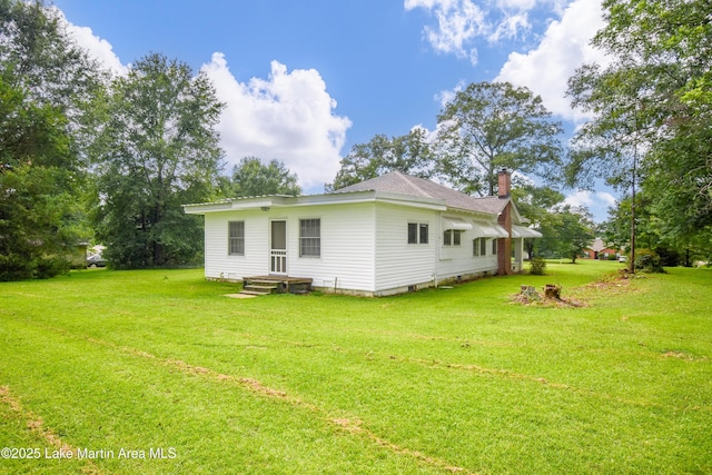 1330 Pearson Chapel Rd, Alexander City, AL 35010 - back of property with a chimney and a yard
