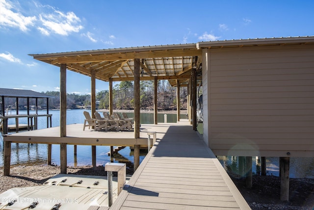 dock area featuring a water view