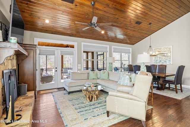 living room with french doors, dark hardwood / wood-style floors, lofted ceiling, wood ceiling, and ceiling fan with notable chandelier