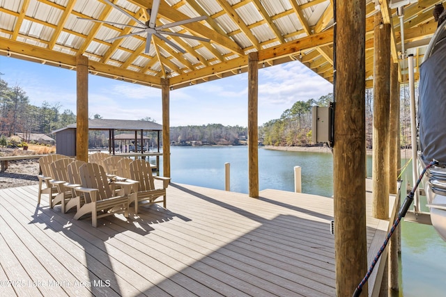 view of dock featuring a gazebo and a water view