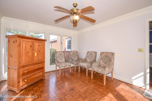 unfurnished room with ornamental molding, parquet flooring, and ceiling fan