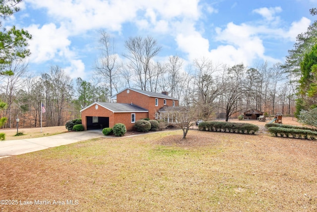 view of side of property featuring a yard