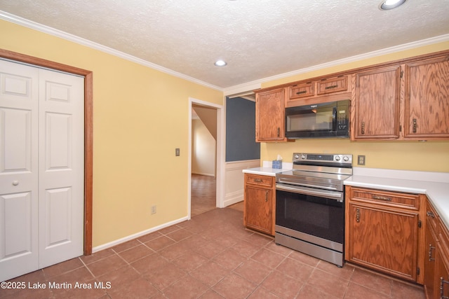 kitchen featuring light tile patterned flooring, crown molding, stainless steel electric stove, and a textured ceiling