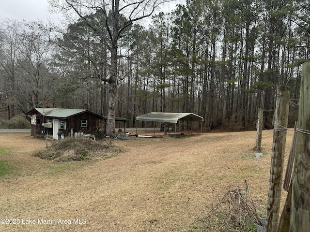 view of yard featuring a carport