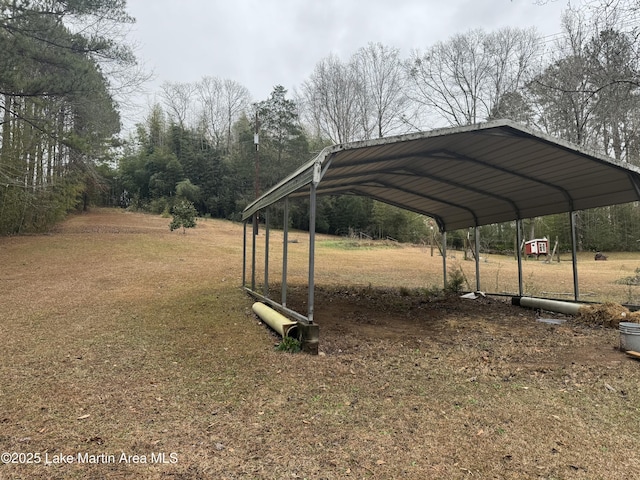 view of vehicle parking featuring a carport