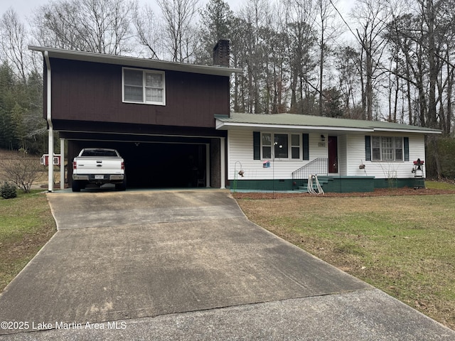 view of front of house featuring a porch, a garage, and a front yard