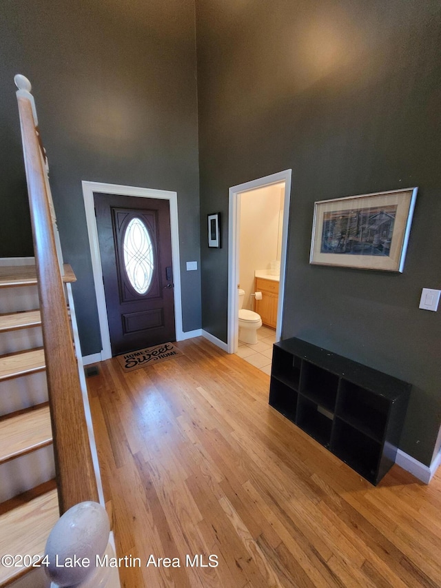 entryway with light hardwood / wood-style flooring