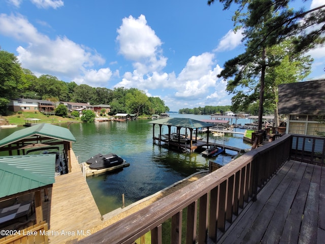 dock area with a water view