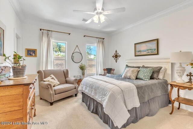 218 Williams Rd, Alexander City, AL 35010 - bedroom with light colored carpet, crown molding, and a ceiling fan