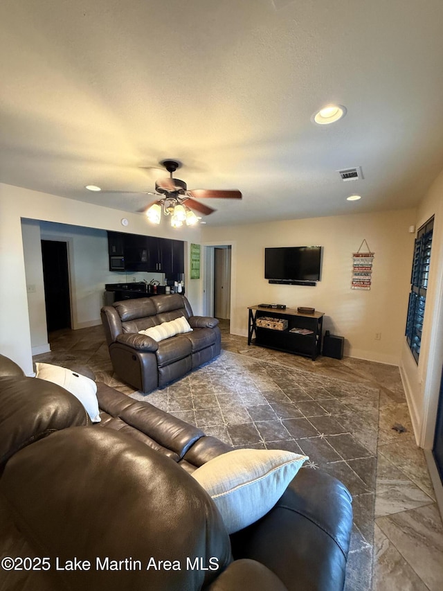 43 Shady Cv, Dadeville, AL 36853 - living area with ceiling fan, recessed lighting, and marble finish floors