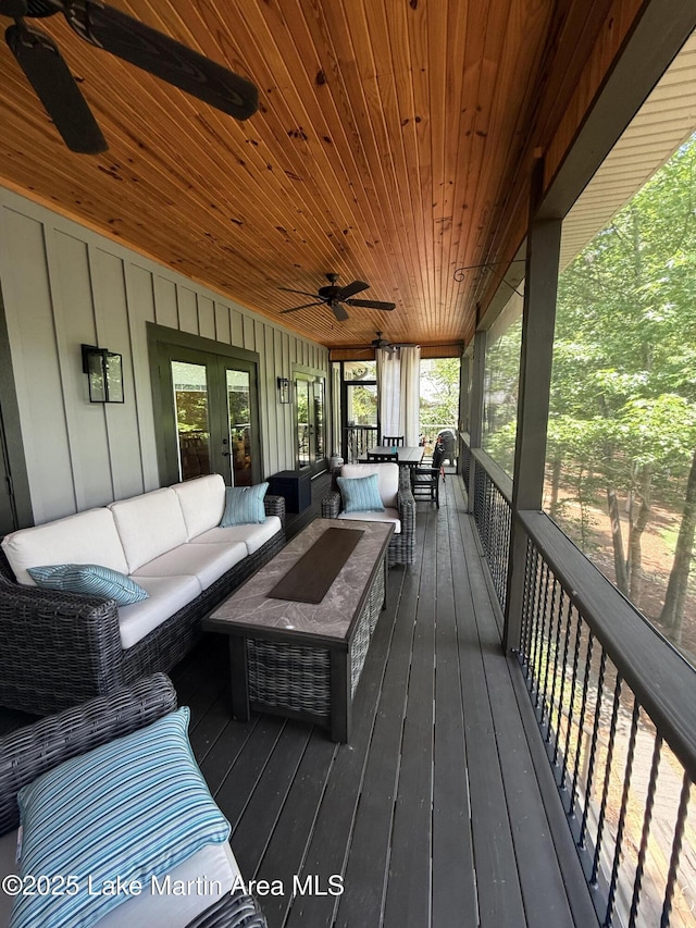 43 Shady Cv, Dadeville, AL 36853 - wooden deck featuring french doors, an outdoor living space, and a ceiling fan