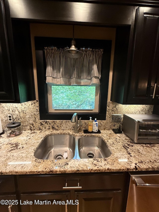 43 Shady Cv, Dadeville, AL 36853 - kitchen with light stone countertops, tasteful backsplash, and dishwasher