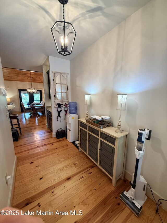 43 Shady Cv, Dadeville, AL 36853 - hall featuring a chandelier and light wood finished floors
