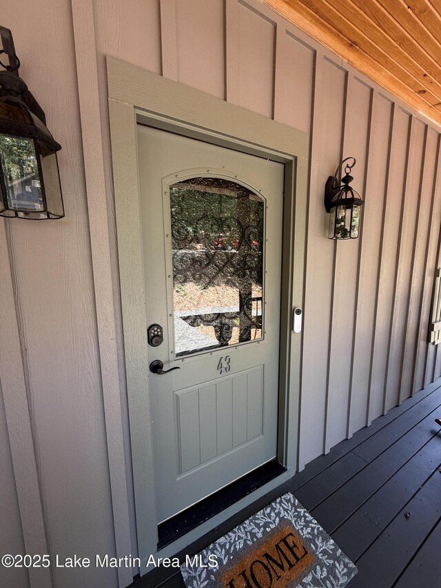 43 Shady Cv, Dadeville, AL 36853 - view of exterior entry featuring board and batten siding