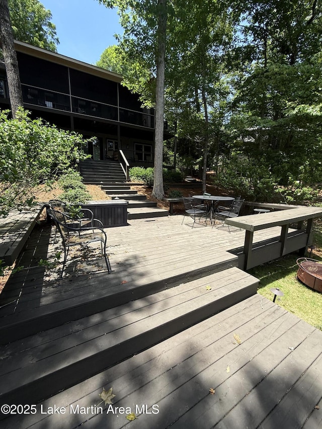 43 Shady Cv, Dadeville, AL 36853 - wooden deck with outdoor dining space and stairs