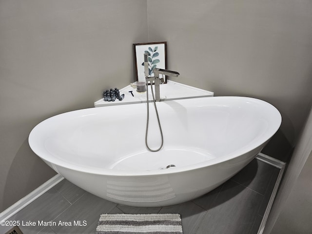 interior space with sink and a bathing tub