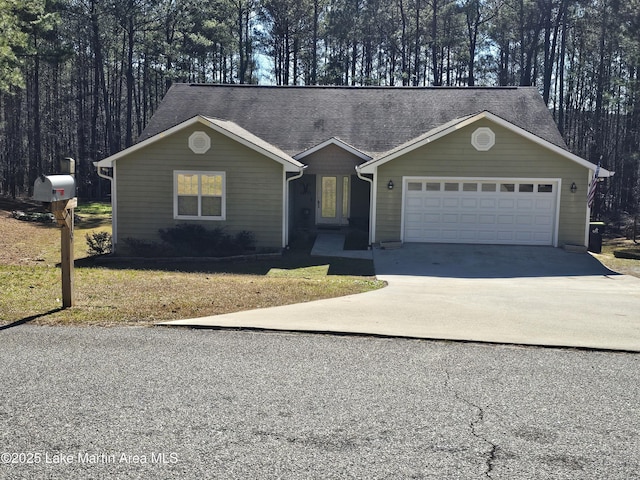 single story home featuring a garage