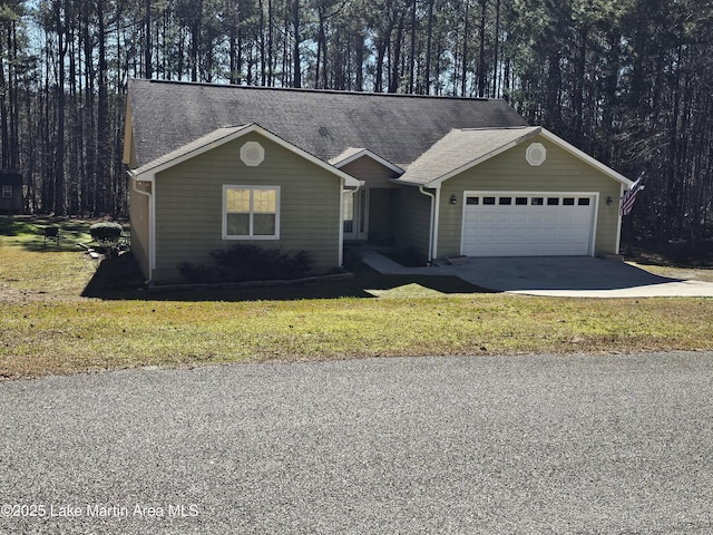 ranch-style house featuring a front yard and a garage