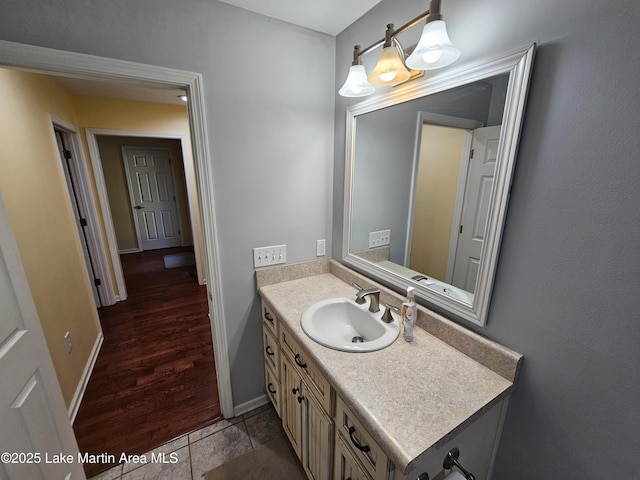 bathroom with tile patterned flooring and vanity