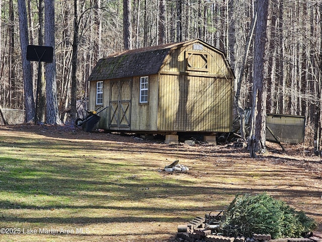 view of outdoor structure with a yard