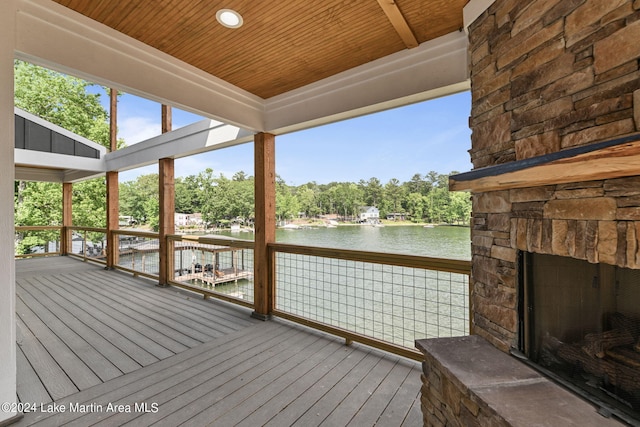 wooden terrace with a water view