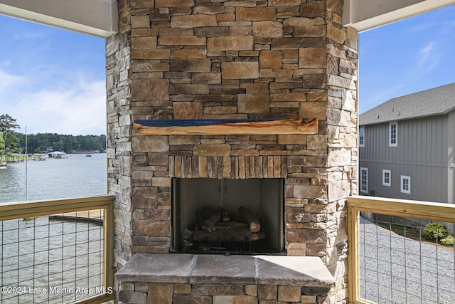 exterior details with an outdoor stone fireplace