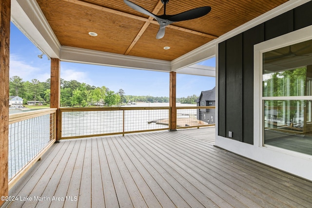 wooden deck featuring ceiling fan