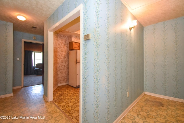 405 4th St, Tallassee, AL 36078 - hallway with wallpapered walls