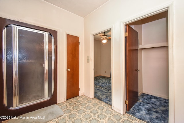 405 4th St, Tallassee, AL 36078 - bathroom with a shower stall and a ceiling fan