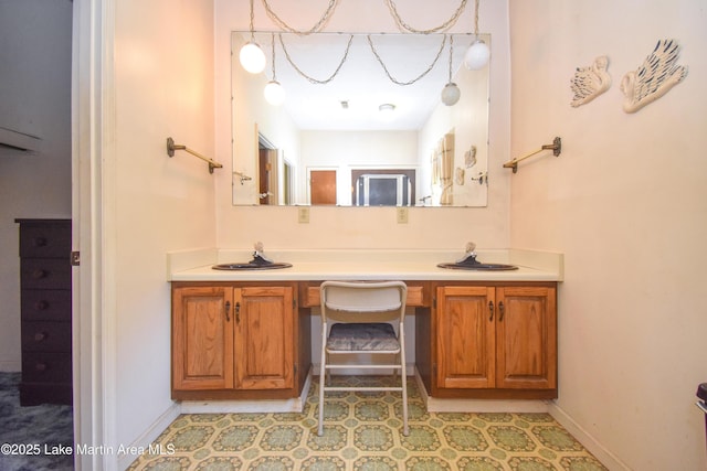 405 4th St, Tallassee, AL 36078 - bathroom featuring vanity and baseboards