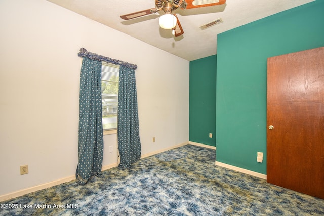 405 4th St, Tallassee, AL 36078 - empty room with ceiling fan and carpet floors