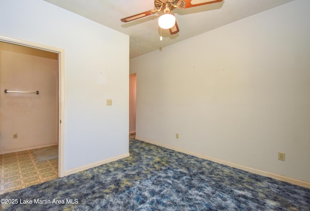 405 4th St, Tallassee, AL 36078 - carpeted empty room with a ceiling fan and baseboards