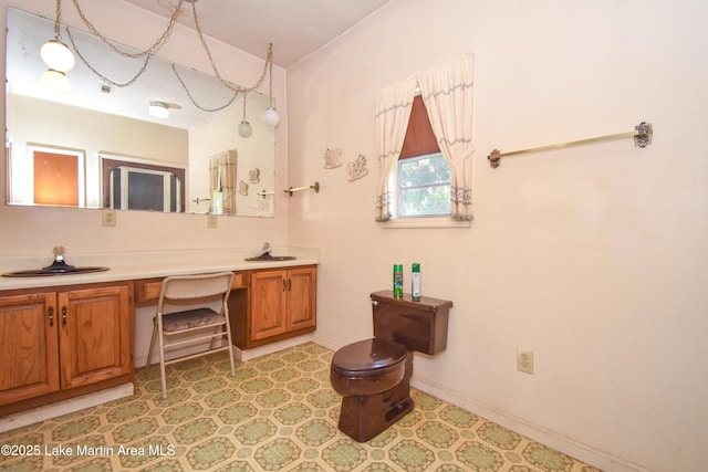 405 4th St, Tallassee, AL 36078 - bathroom with double vanity and tile patterned floors