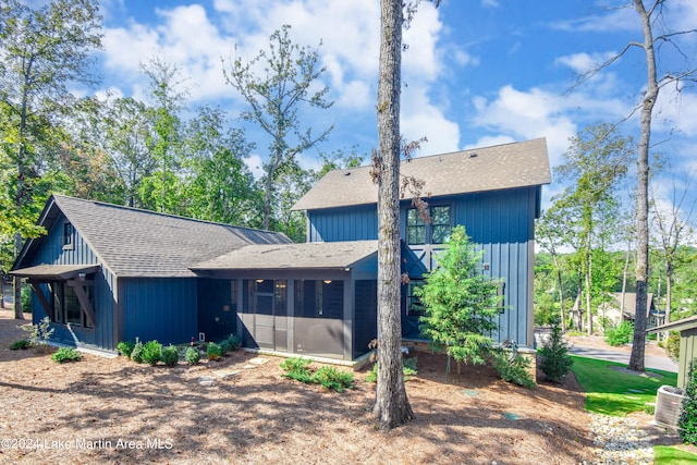 250 Old Jay Rd, Eclectic, AL 36024 - rear view of house with roof with shingles and a sunroom