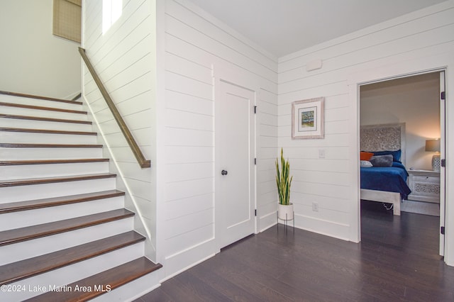 250 Old Jay Rd, Eclectic, AL 36024 - entryway with dark wood-style flooring, stairway, and wooden walls